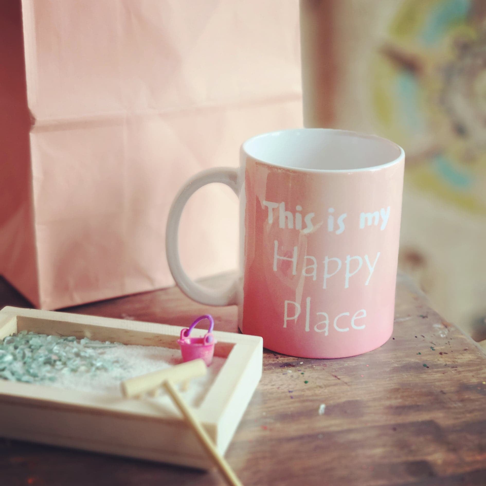This is my happy place coffee mug on table