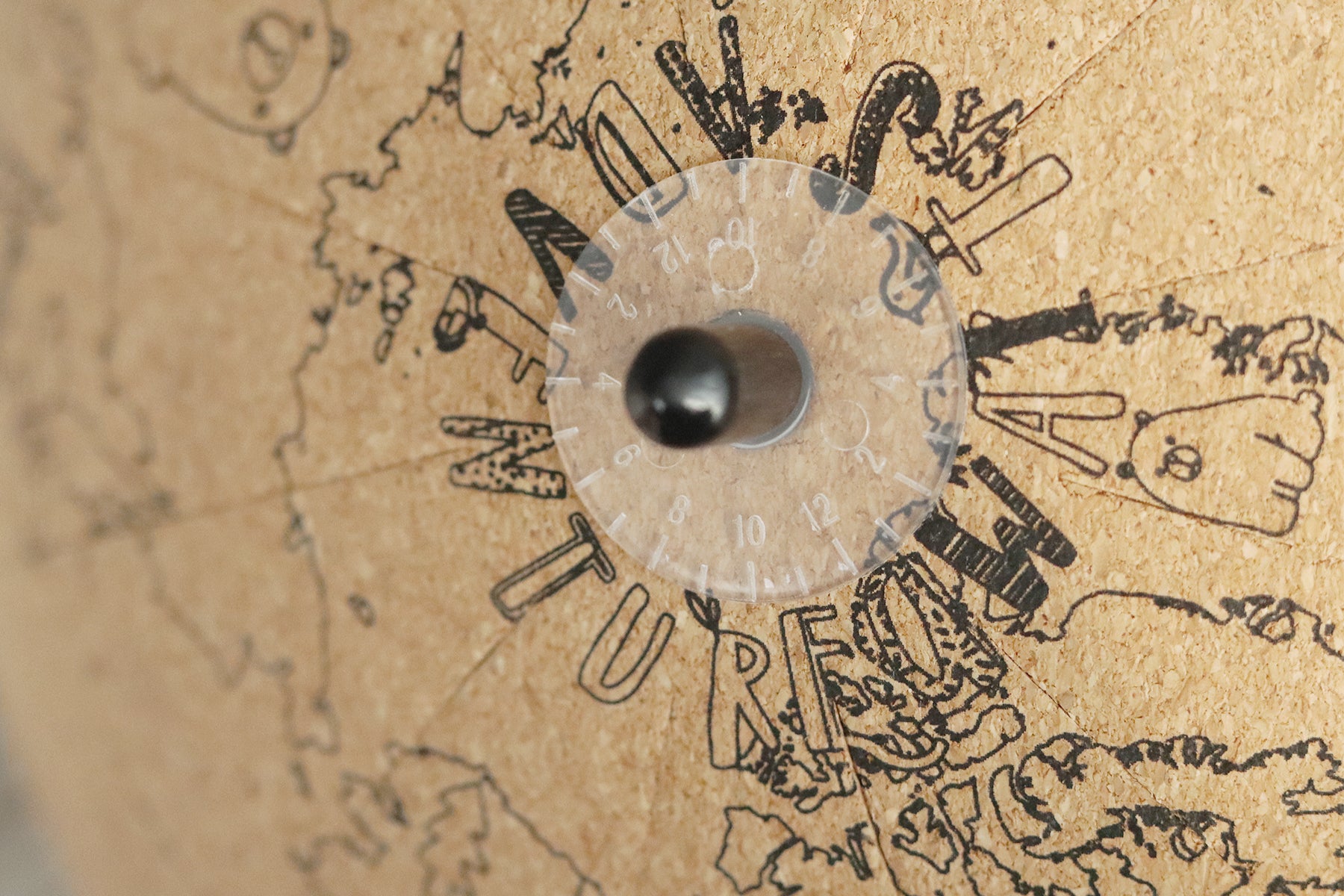 Close up of the top of the cork globe