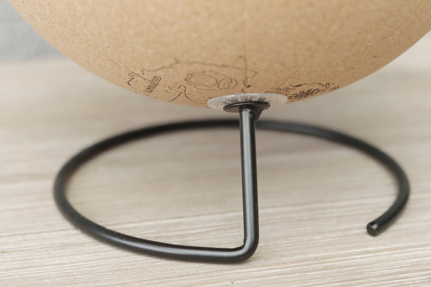 close up of the cork globe stand