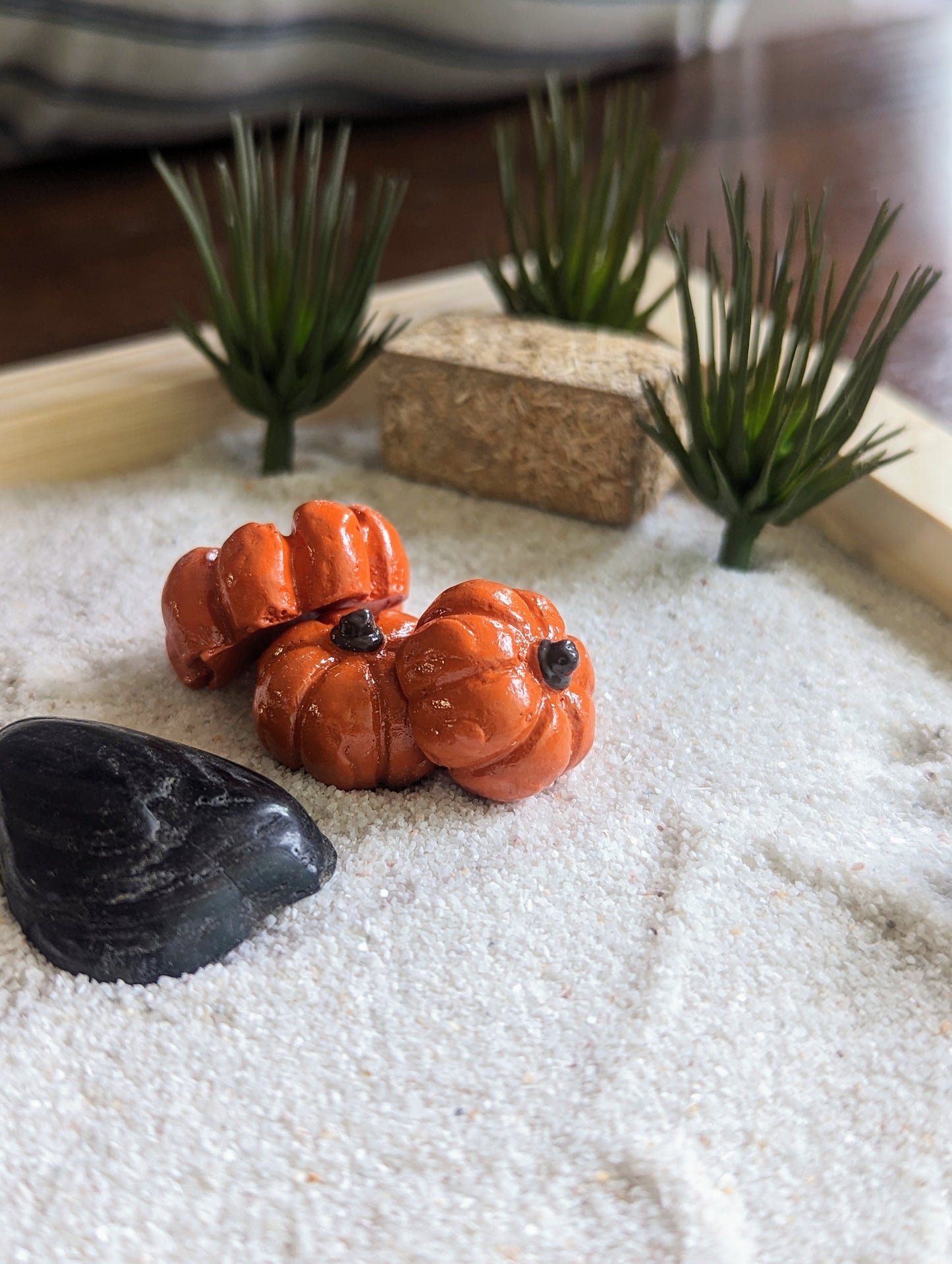 Staged photo of miniature zen garden for fall decor and sand tray