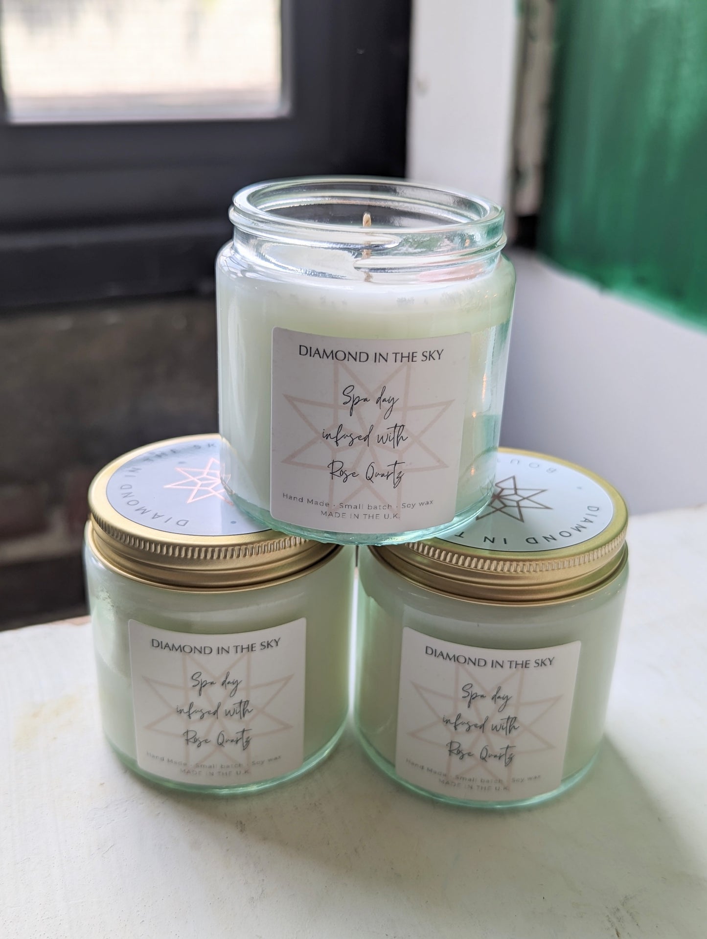 Spa day soy candle with rose quartz stone stacked