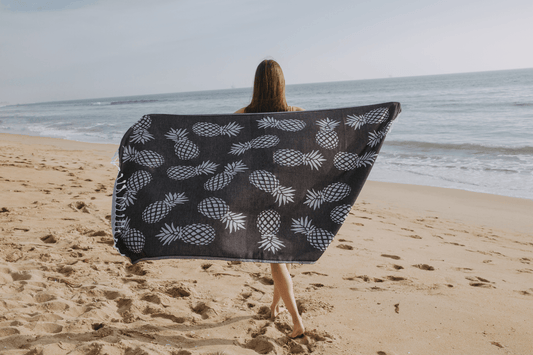 pineapple Turkish towel in use at beach