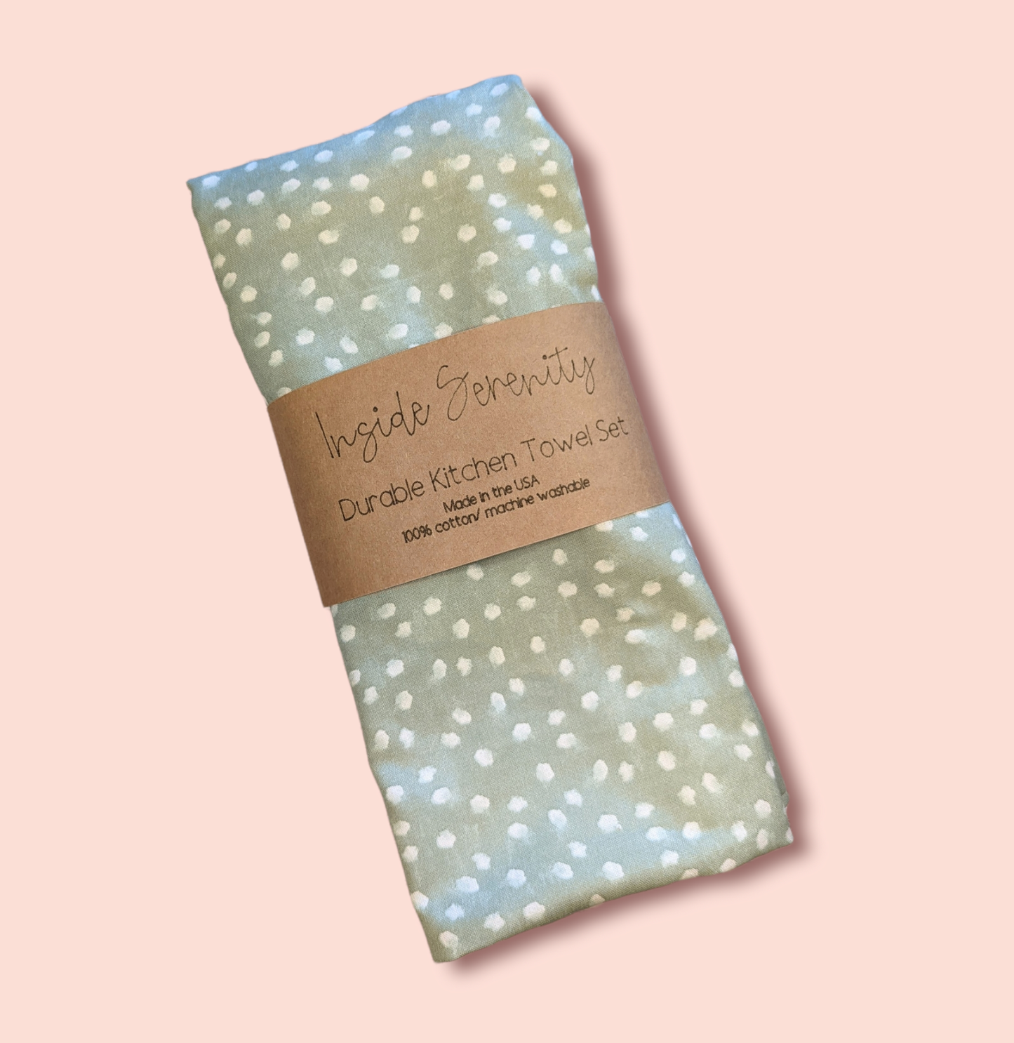 Green dot kitchen towel with pink background