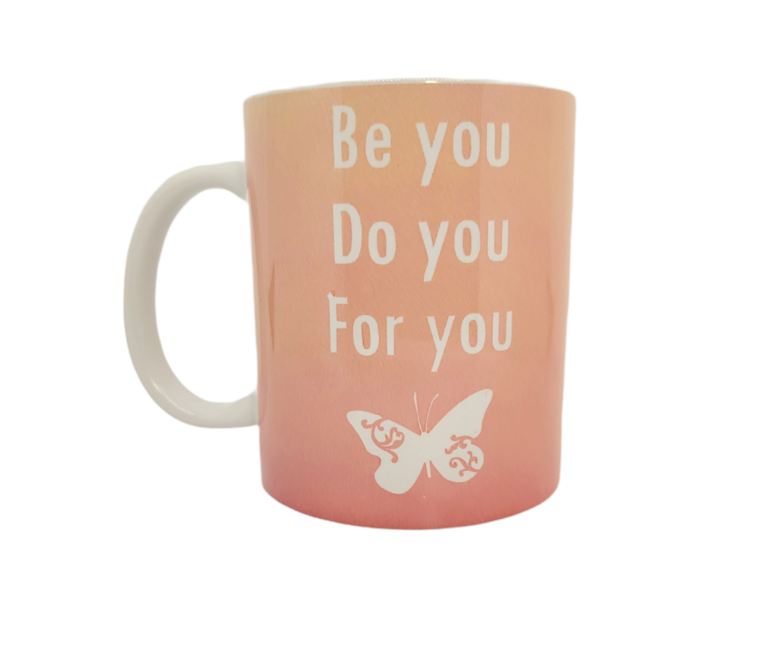 Pink 11 oz ceramic coffee mug that says be you do you for you