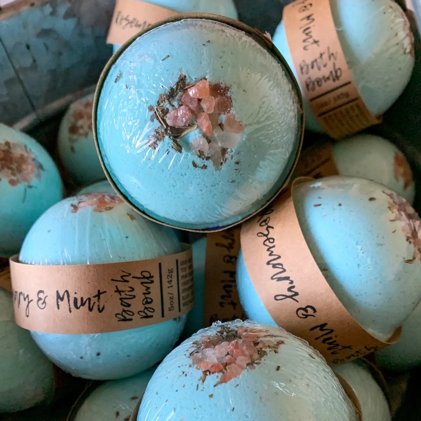 group of llight blue essential oil bath bomb scented rosemary & mint