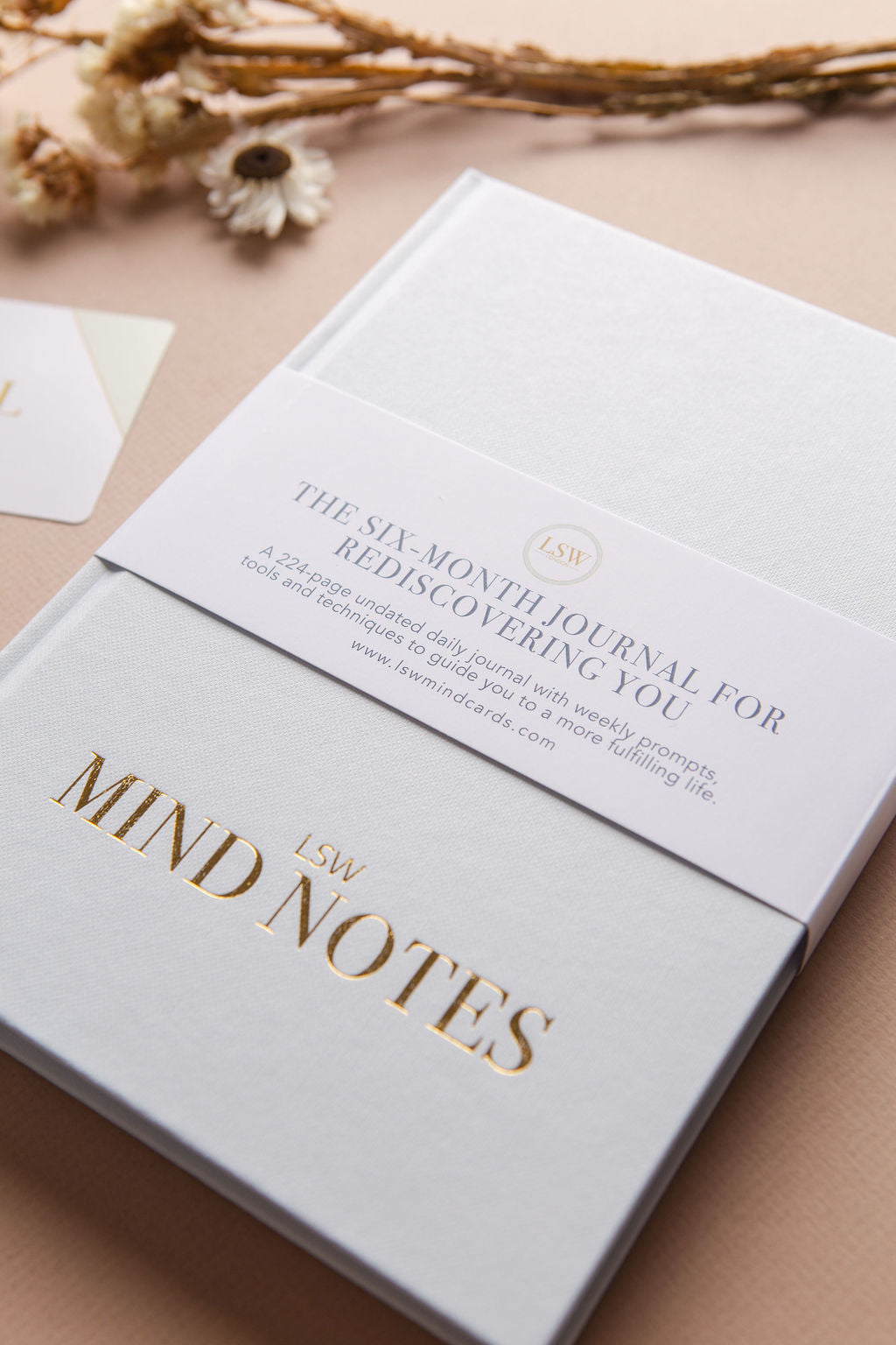 close up on daily wellbeing, mindfulness, ad gratitude journal from mindnotes