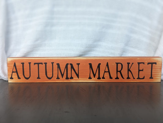 orange stained autumn market sign