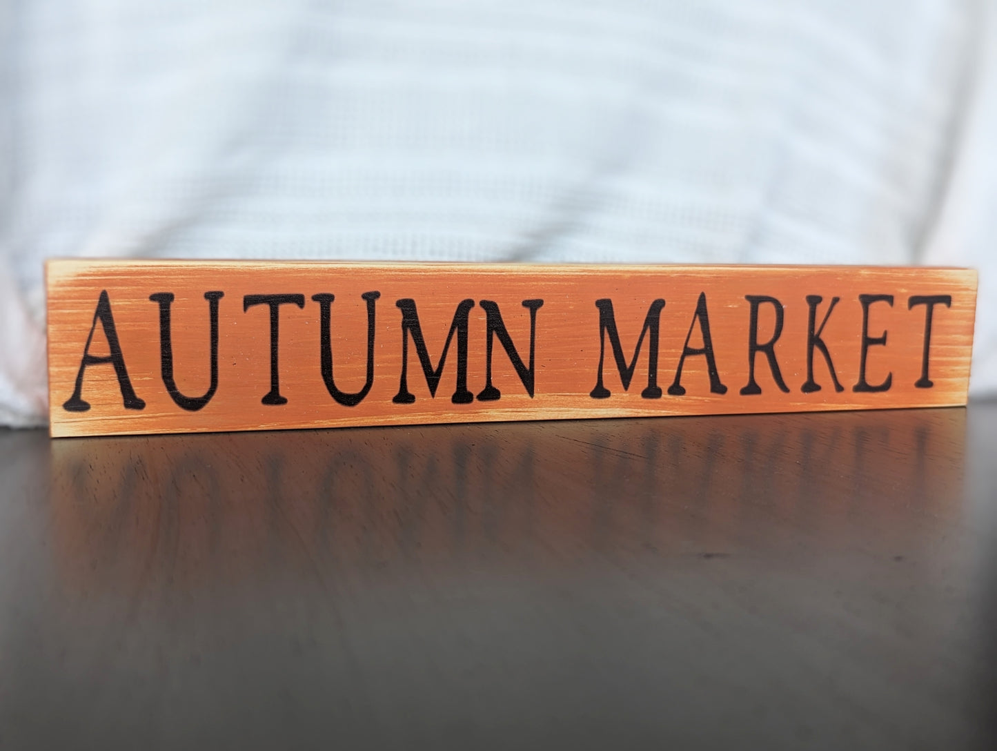 orange autumn market sign black writing