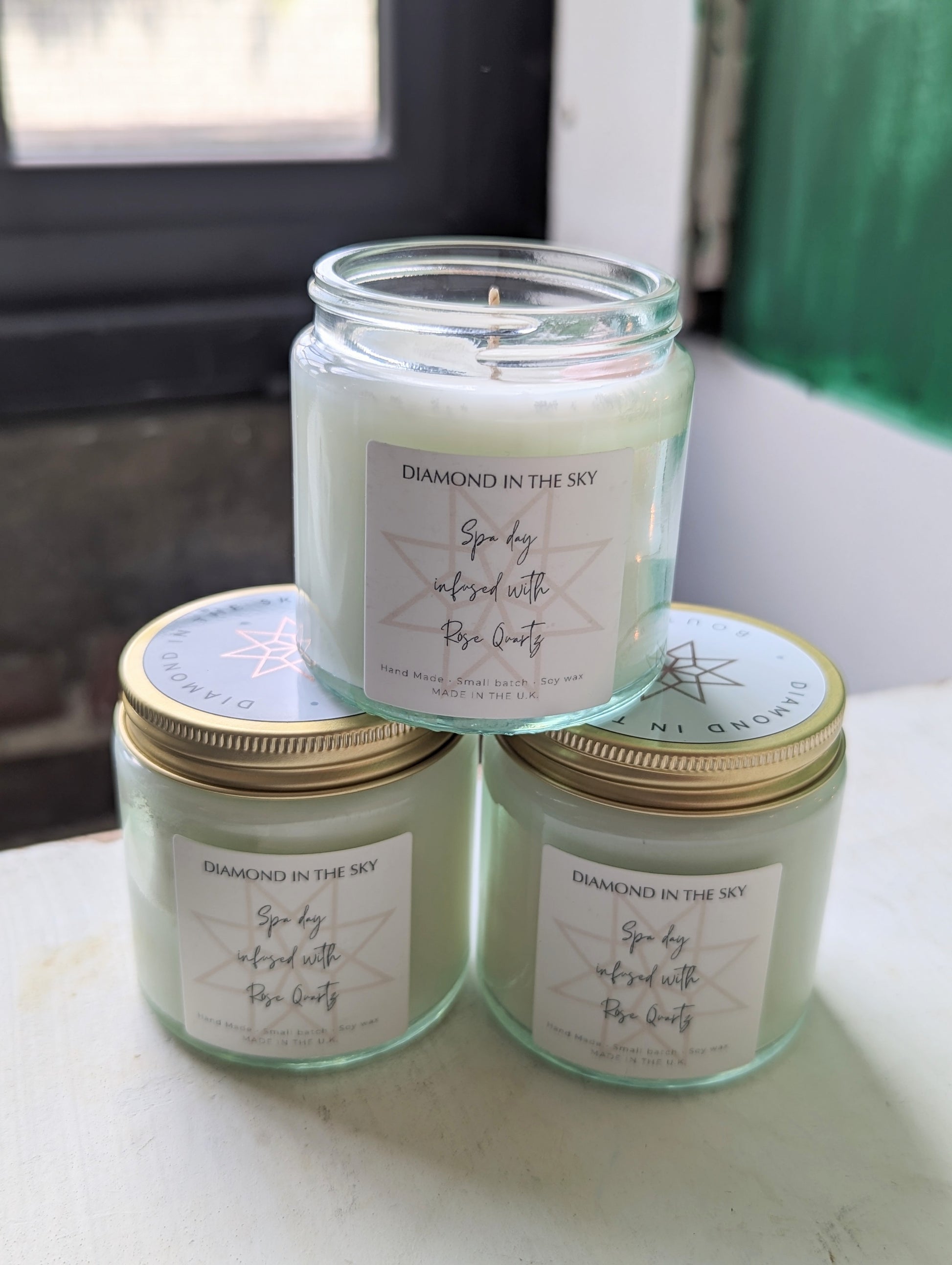 Spa day soy candle with rose quartz stone stacked