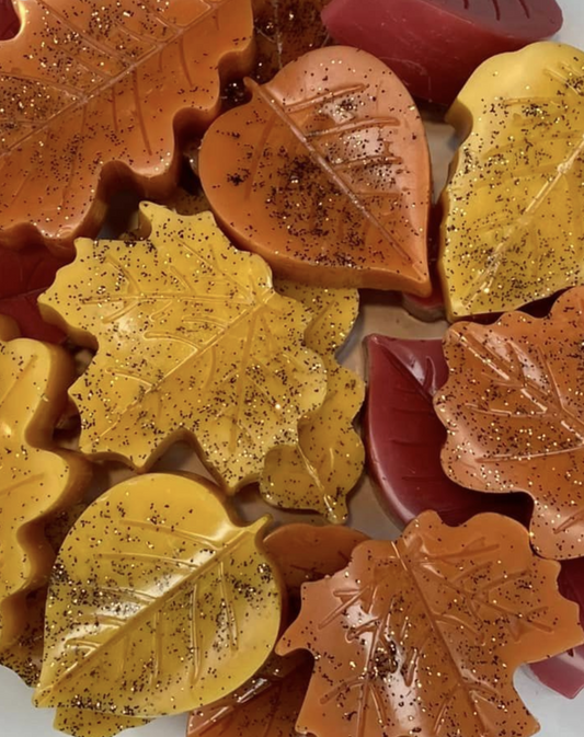 scented wax melts in the shape of leaves.
