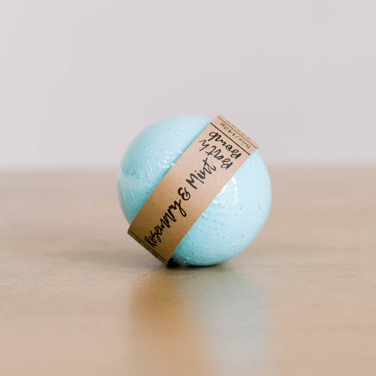 light blue essential oil bath bomb scented rosemary & mint.
