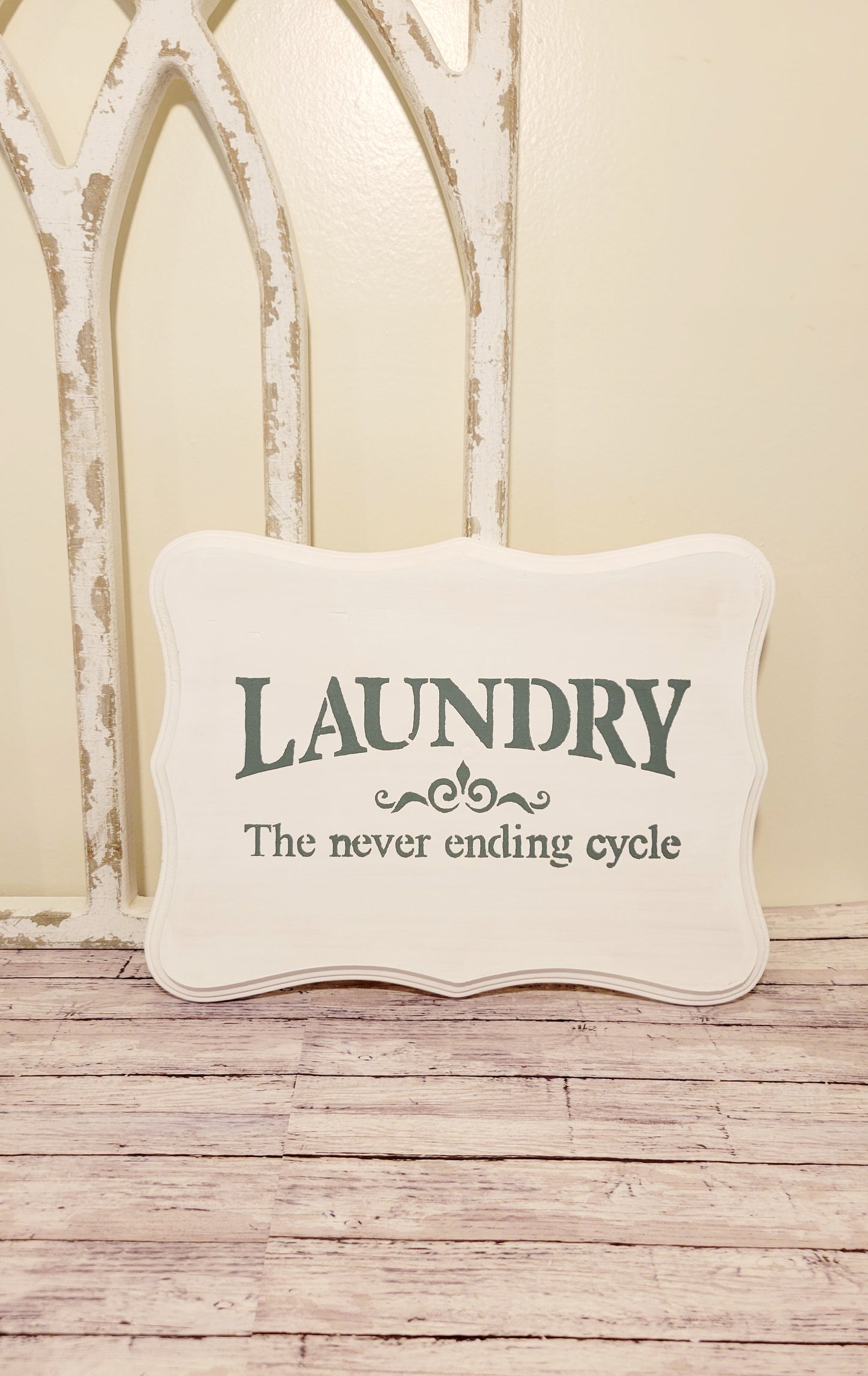 white laundry sign- laundry never ending sign