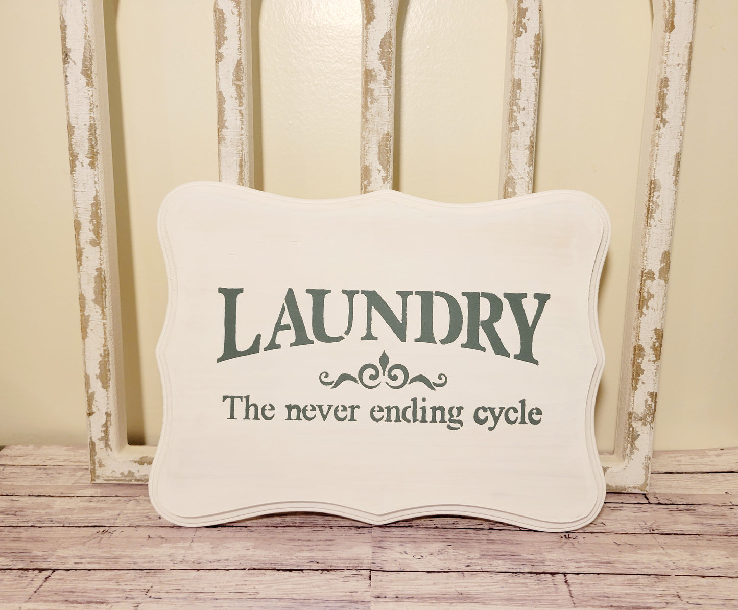 white laundry sign- laundry never ending sign