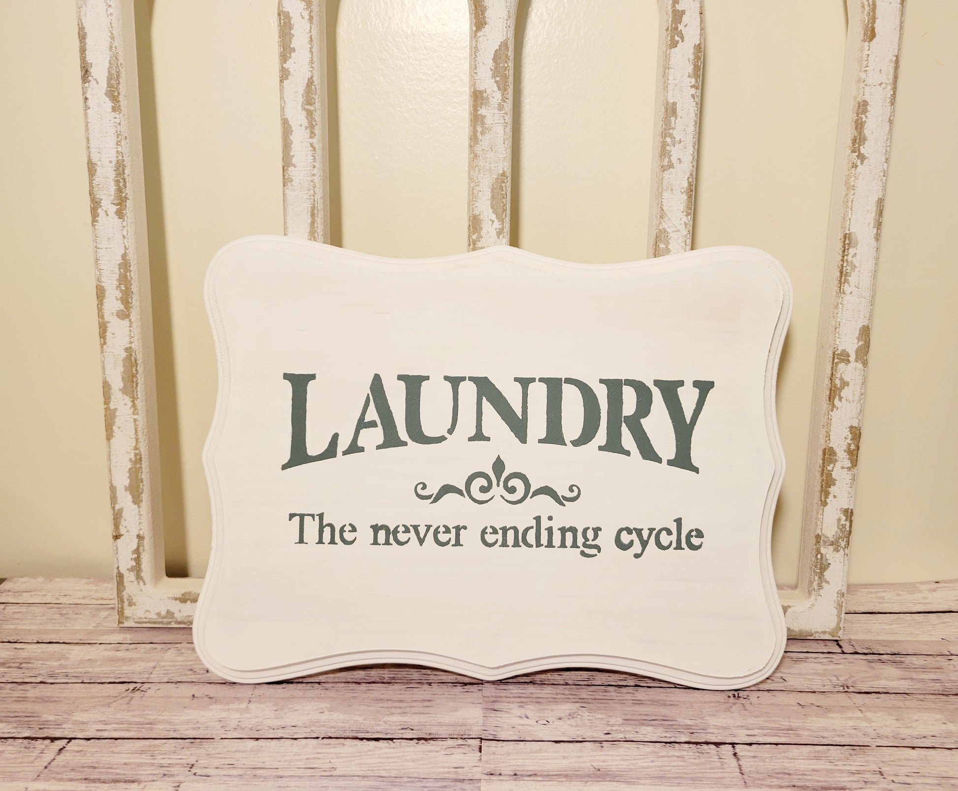 white laundry sign- laundry never ending sign