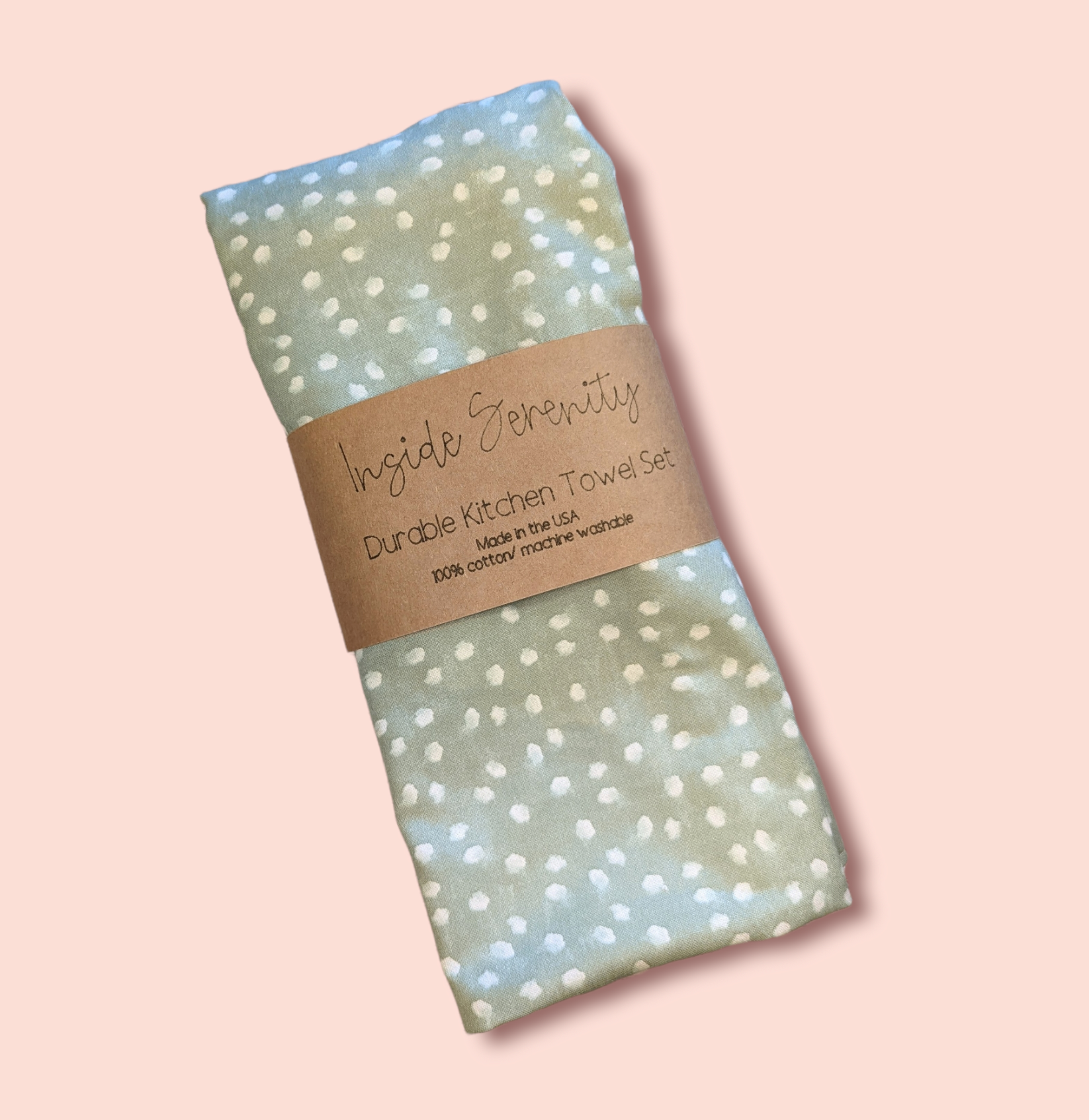 Green dot kitchen towel with pink background