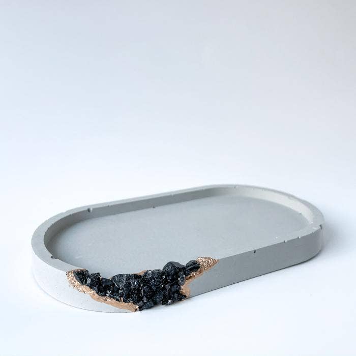 Geode vanity tray with black tourmaline on one side. color, light grey.