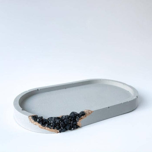 Geode vanity tray with black tourmaline on one side. color, light grey.