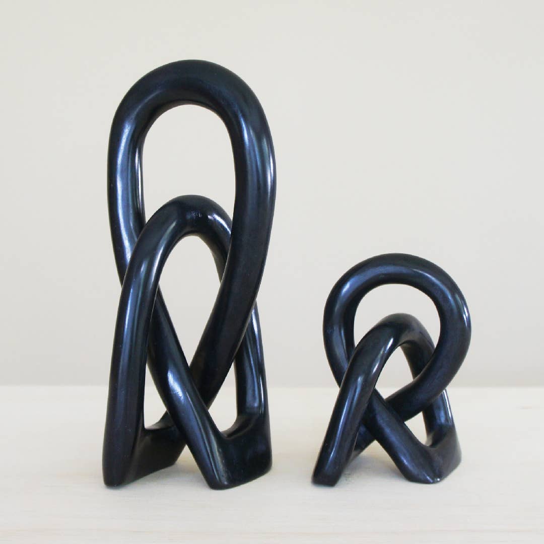 black wedding knot hand carved out of soapstone.
