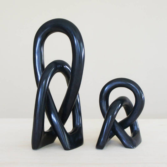 black wedding knot hand carved out of soapstone.